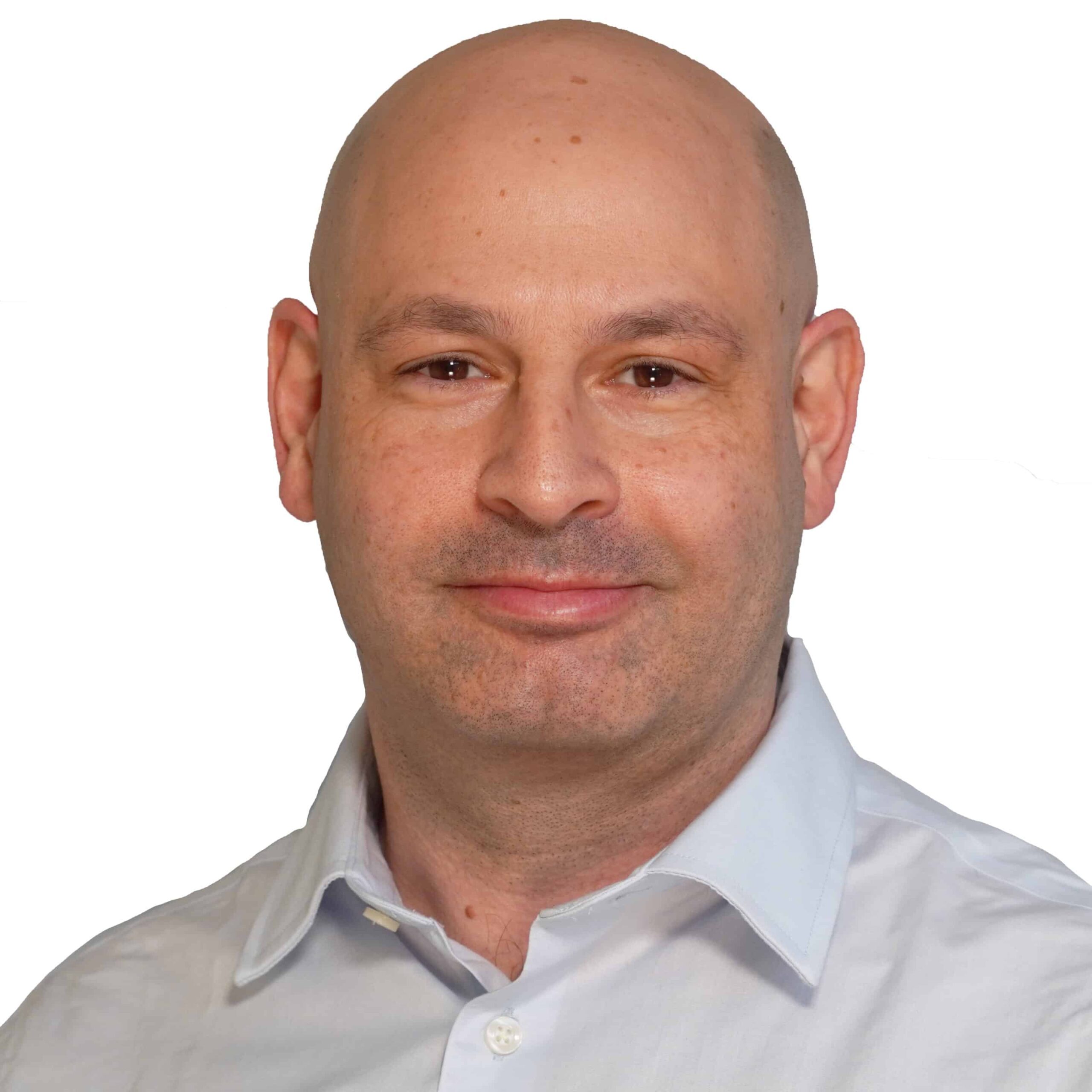 Portrait of a bald man in a white shirt with a neutral expression on a plain background.